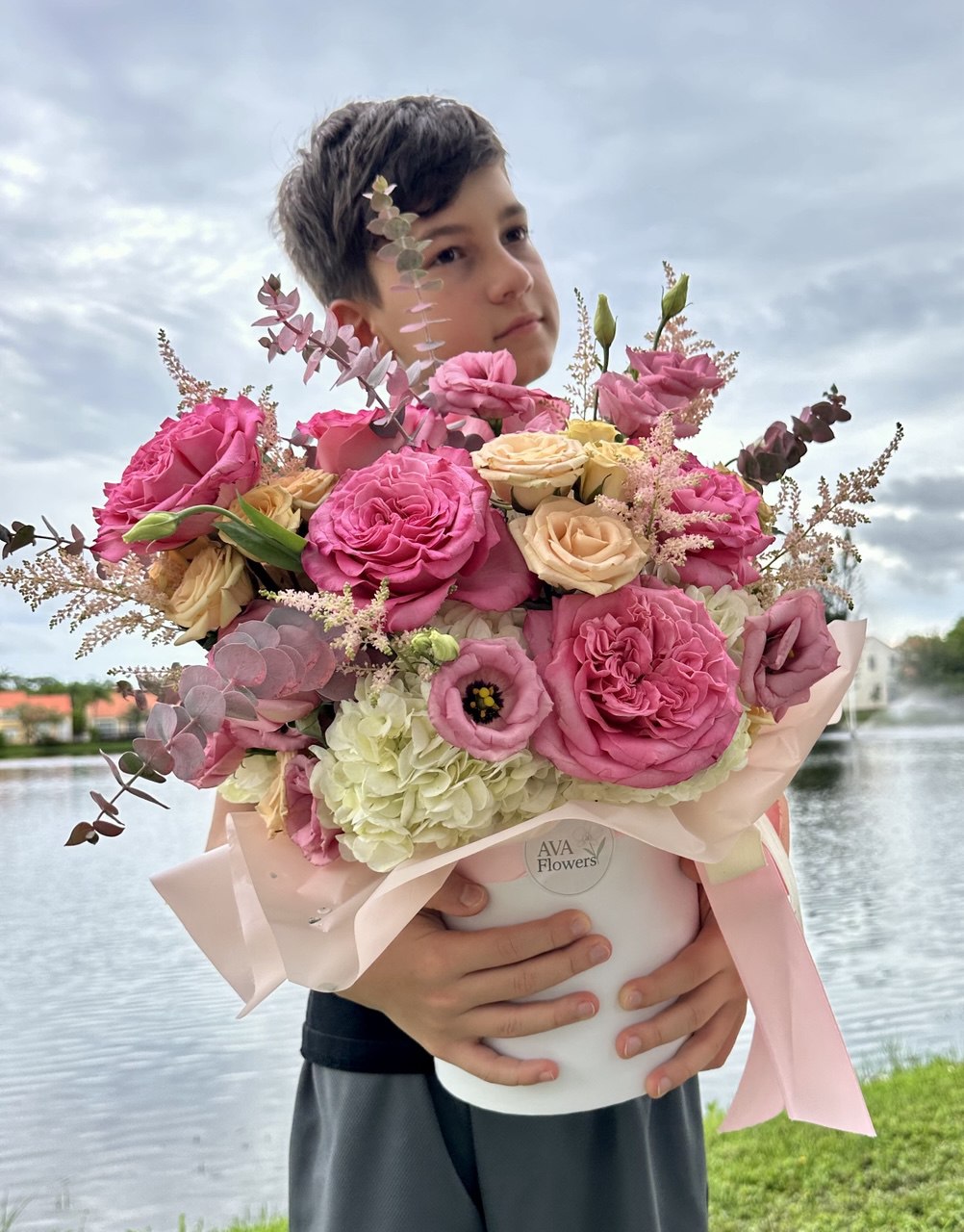 Luxurious flower arrangement “Pink Cloud” with pastel roses, hydrangeas and delicate seasonal blooms in a stylish box by Ava Flowers.