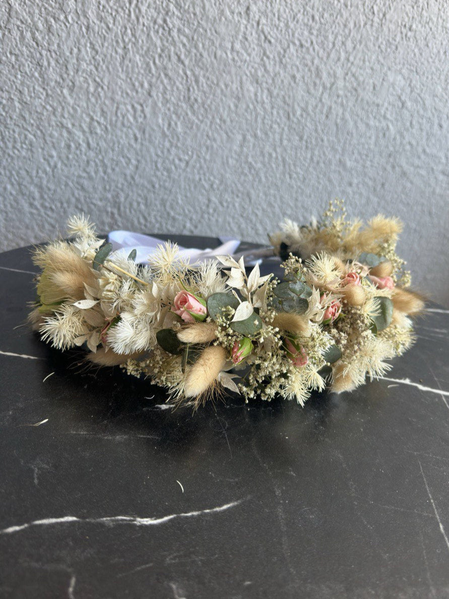 Handcrafted wedding flower crown made with fresh seasonal blooms, ideal for bridesmaids and flower girls. Elegant floral headpiece for weddings and romantic celebrations.