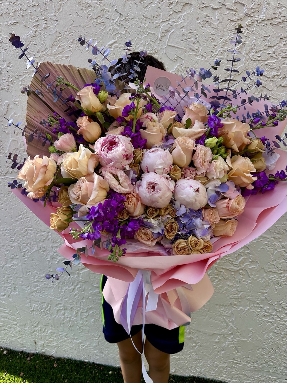 Premium pastel flower arrangement with peonies, roses, hydrangea, and lavender stock flowers