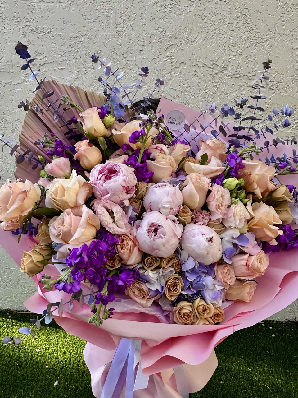 Send a breathtaking XL flower bouquet with peonies, roses, lisianthus, hydrangea, and tinted eucalyptus. Luxury same-day flower delivery in Miami and Hollywood, Florida.