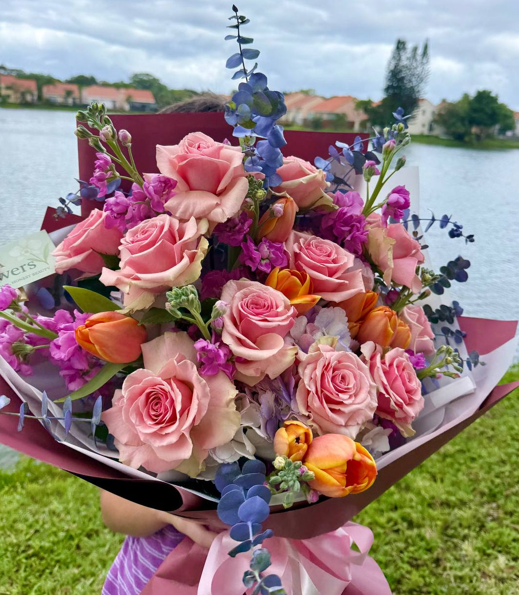 Elegant pink rose bouquet with colorful seasonal flowers for same-day flower delivery in Miami